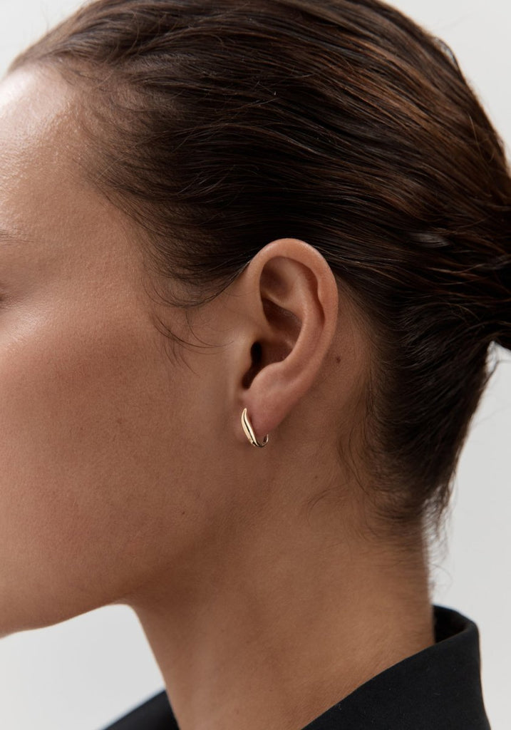 Nina Gordon Debut Hoops Gold worn on model's ear, side profile