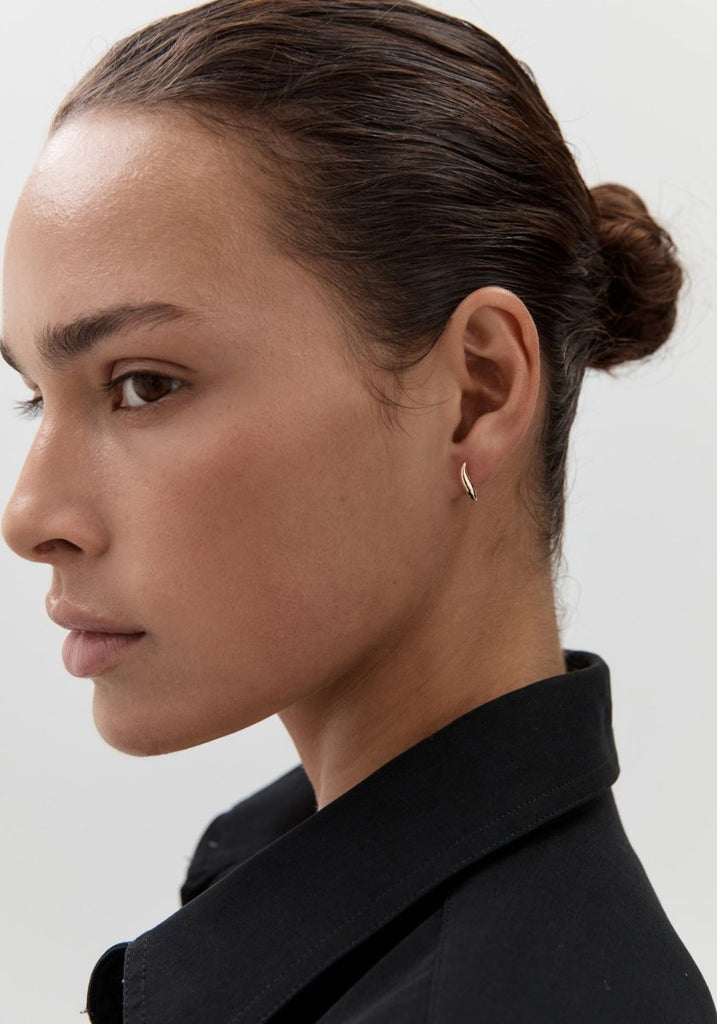 Nina Gordon Debut Hoops Gold worn on model, three-quarter view