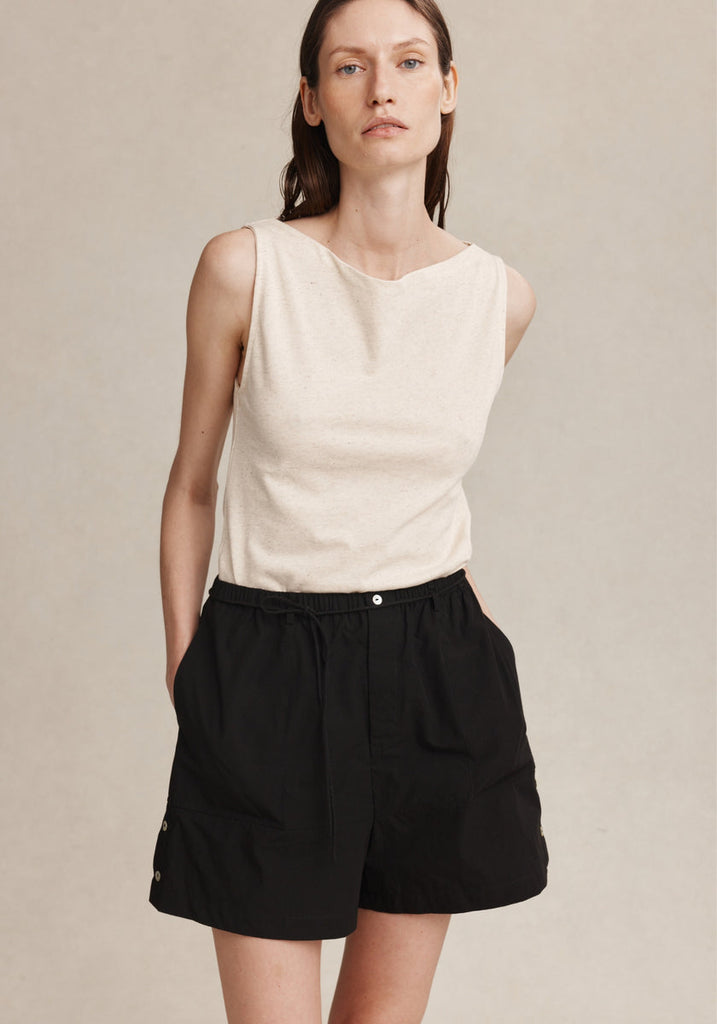 Marle Diya Short in Black, close-up front view showing button fly and pockets