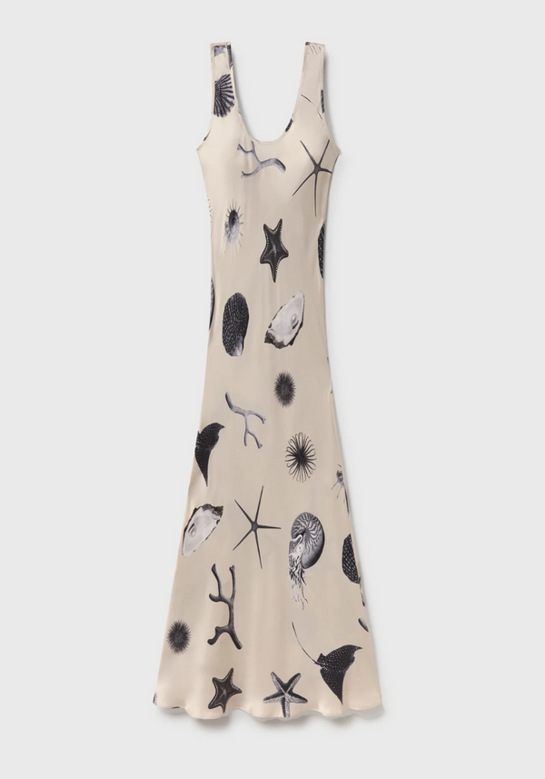 Beige dress with black abstract patterns on a white background