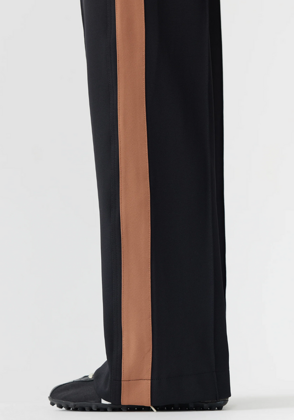 Black pants with a brown stripe on a white background